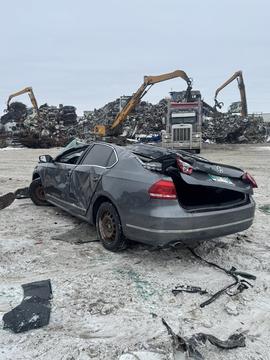 Efficient Scrap Metal Recycling with Heavy Machinery and Crushed Vehicles